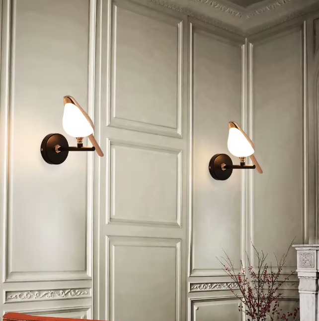 أنارة جداريه طير ذهبي